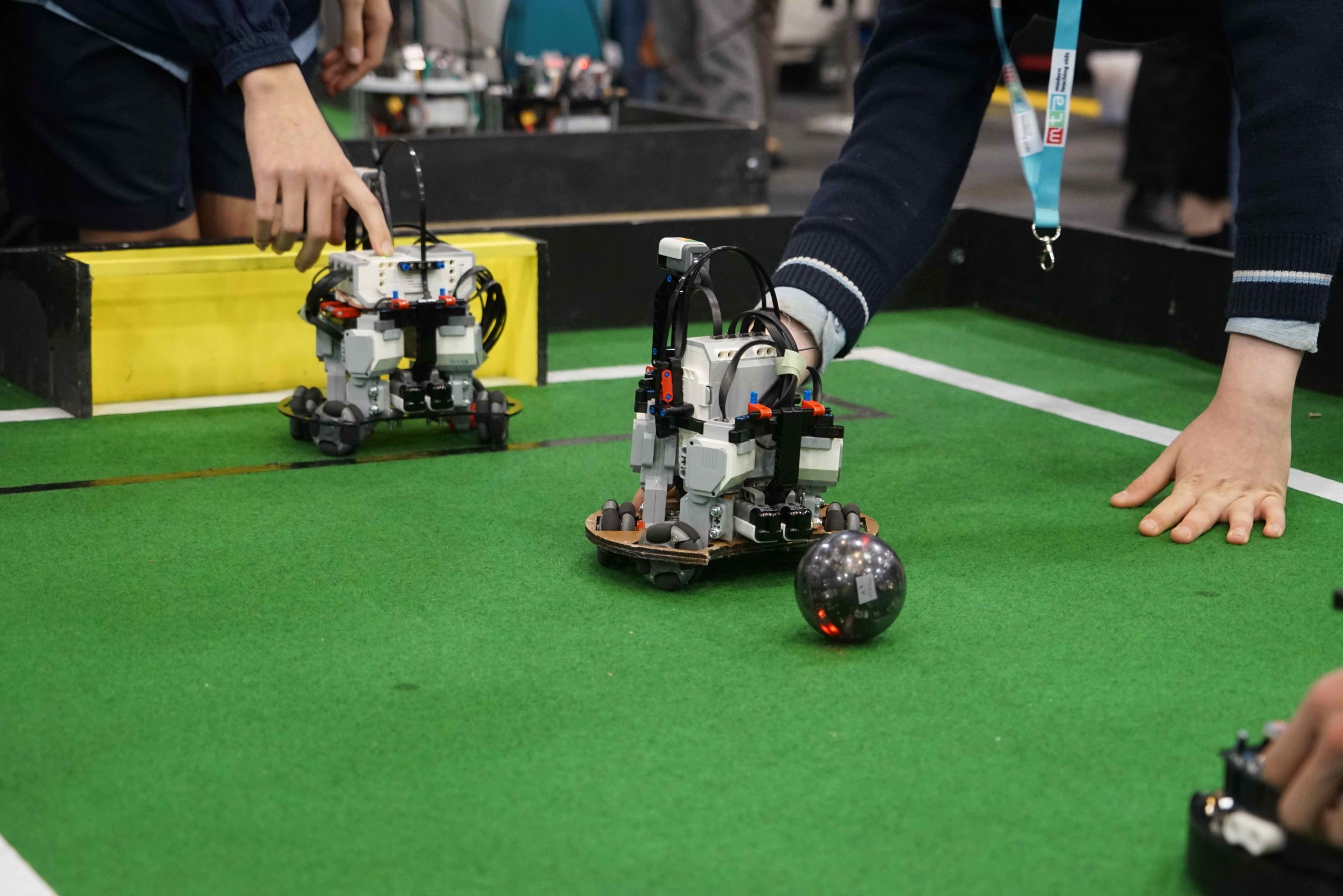 RoboCup robots competing on a soccer field